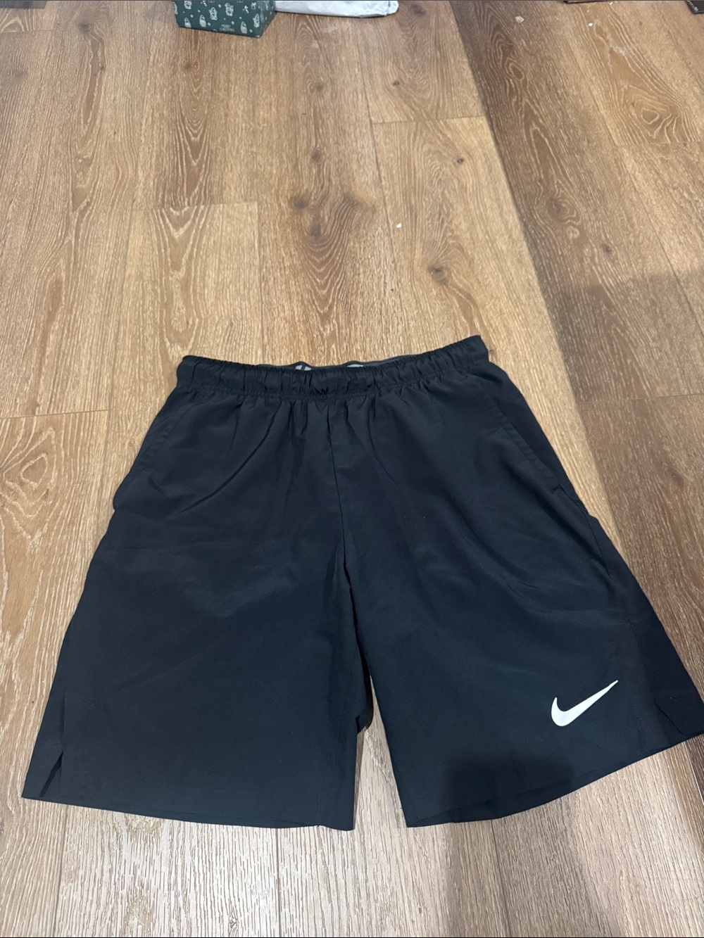Nike Black Shorts with White Swoosh Accent